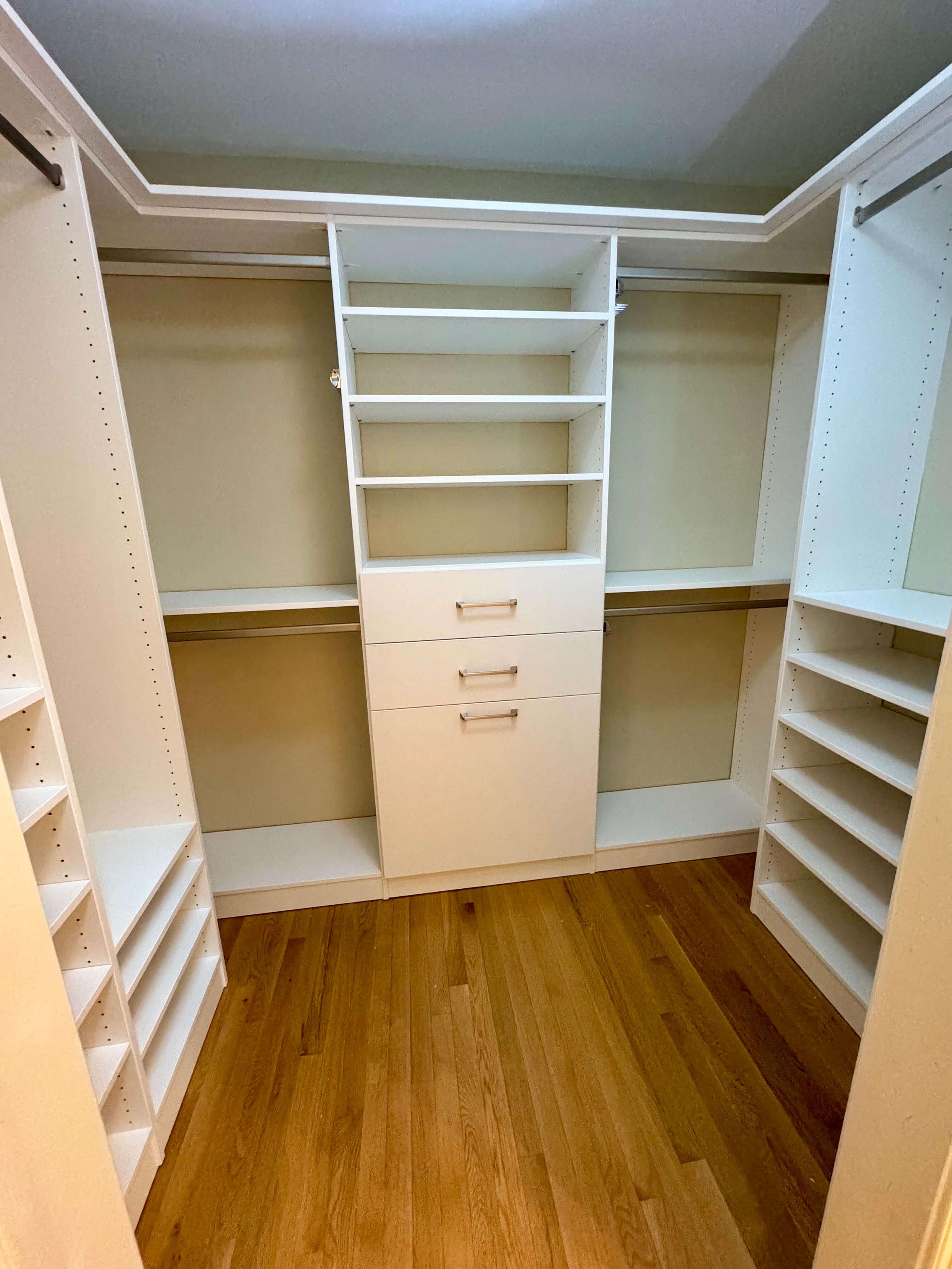 White Custom Closet with Closet Rods, Shelving, and Drawers